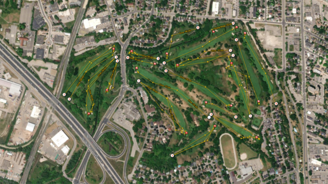 Map of golf course with shots from a round overlaid on it.